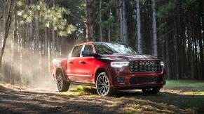 The 2025 Ram 1500 off-roading in the woods