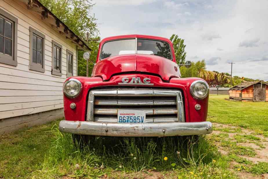 Red GMC pickup truck from after the Grabowsky motor company era.