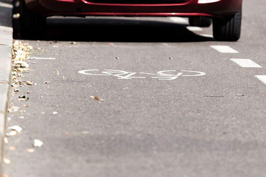 A car parked in a bike lane