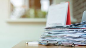 A stack of HOA fines