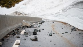 A road covered in snow due to avalanche
