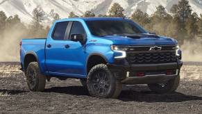 The 2025 Chevy Silverado 1500 off-roading in gravel