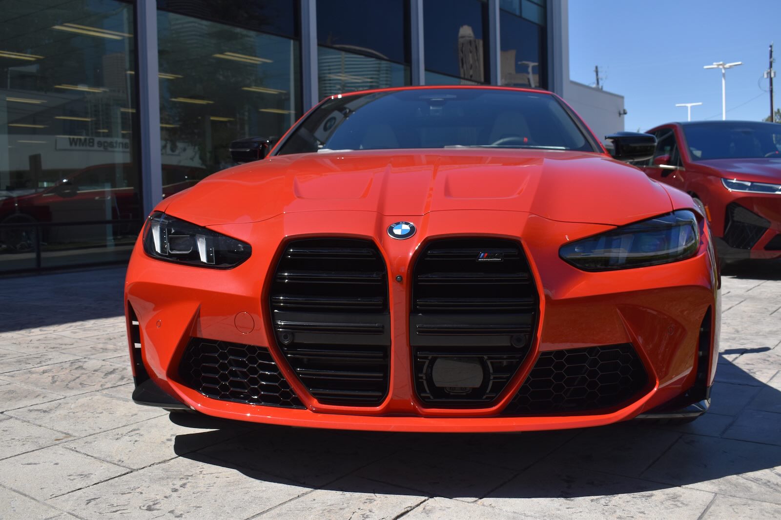Red BMW M4 at a dealership after Florida man tried to buy it