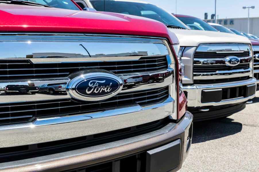Grille of a Ford F-150 pickup truck at a dealership ahead of 2025 repeat recall.