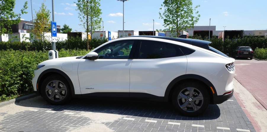 White Ford Mustang EV crossover.
