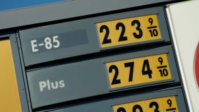Gasoline prices on a pump, showing the 9/10 of a penny surplus.
