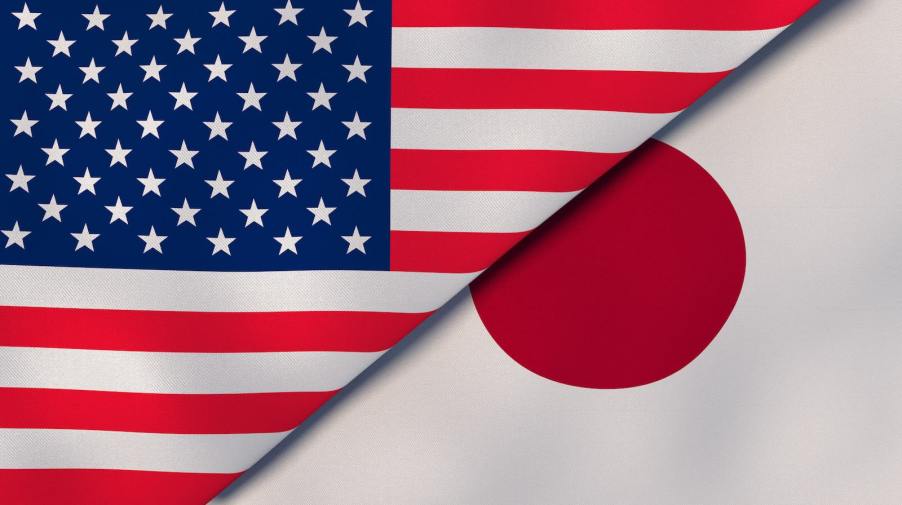 Japanese and American national flags stacked atop each other to symbolize cars tariffs.