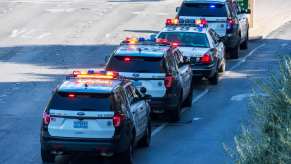 Row of Las Vegas police cars lined up in a blockade to stop a carjacking and murder suspect.