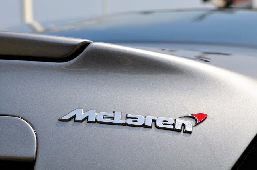 McLaren badge on a silver sports car, soon to be on an SUV