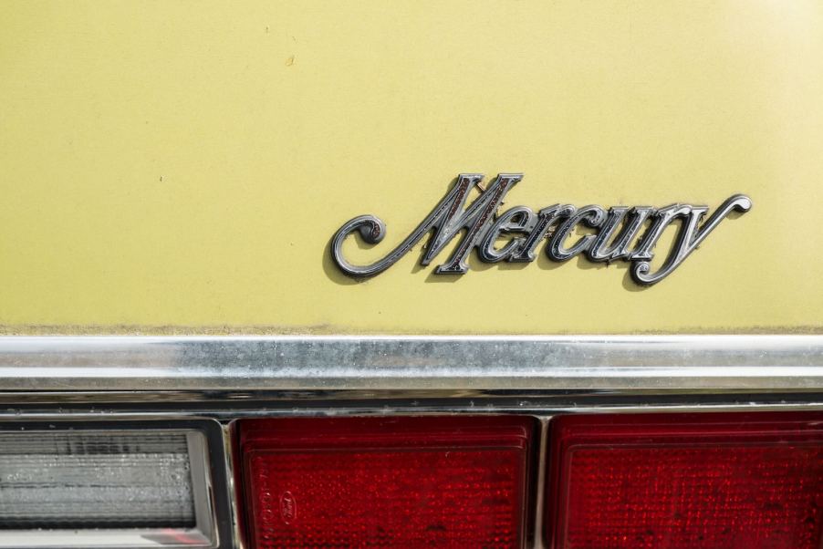 Yellow Mercury Marquis sedan trunk.