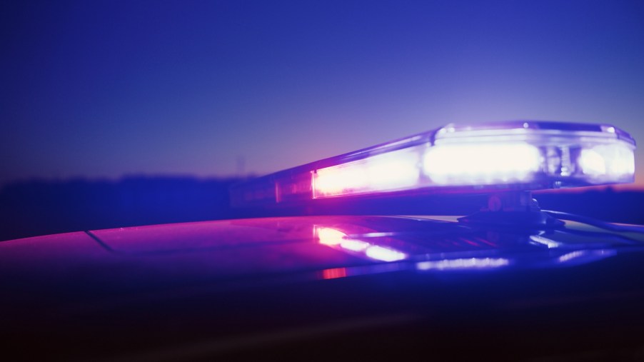 The lights atop an Ohio police cruiser during a chase at night.