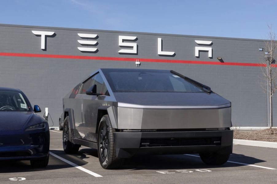 A Tesla Cybertruck parked at a Tesla location.