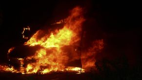 Vehicle on fire at night