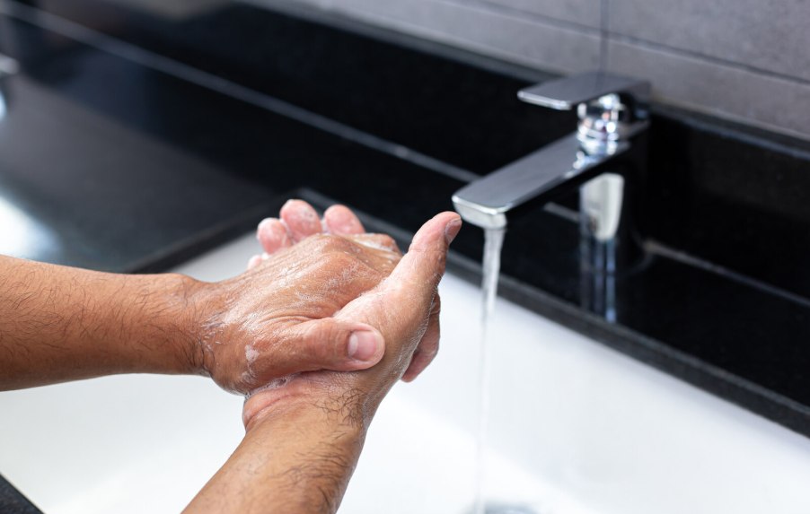 Man washing his hands in close view
