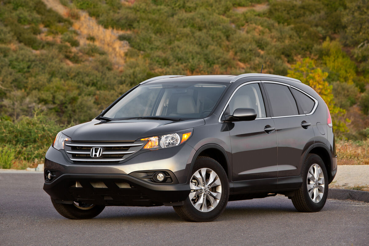 A dark metallic 2014 Honda CR-V parked in left front angle view