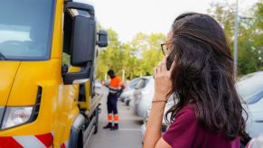 Woman watching her Dodge bought off Facebook marketplace get repossessed as stolen by cops at DMV.