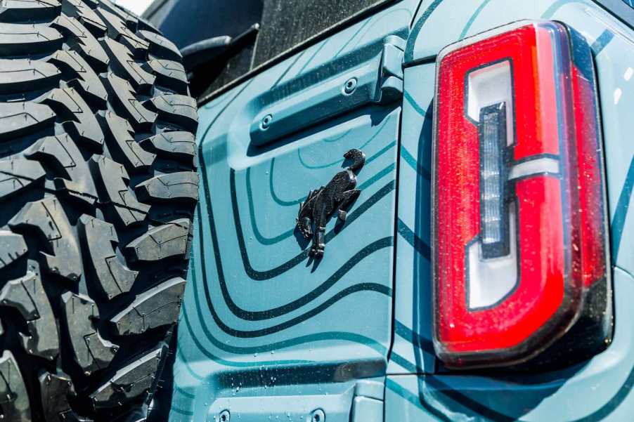 Blue Ford with a black Bronco badge, modified by RTR