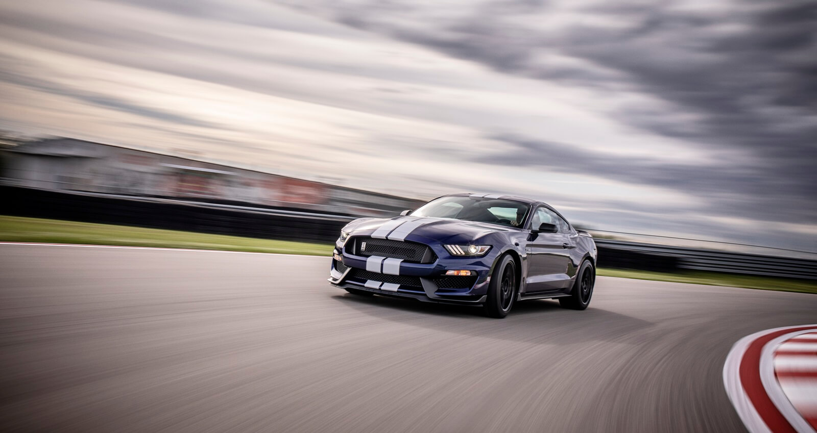 A Ford Mustang Shelby GT350, one of the best modern muscle cars, on the track.