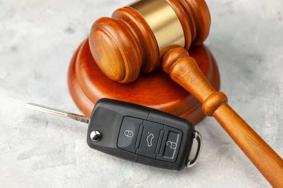 Gavel and a set of pickup truck keys for a government surplus auction.