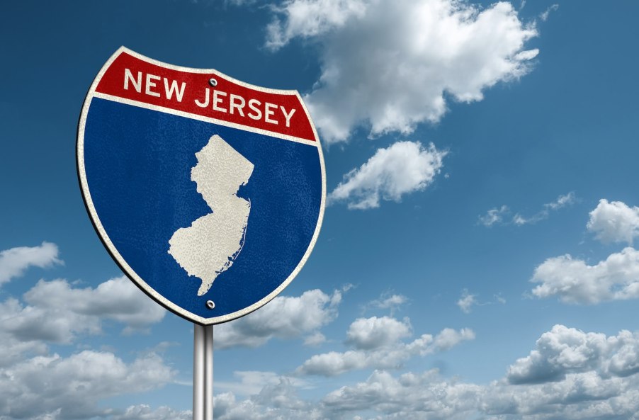 Sign for the New Jersey turnpike where copied license plates are a plague