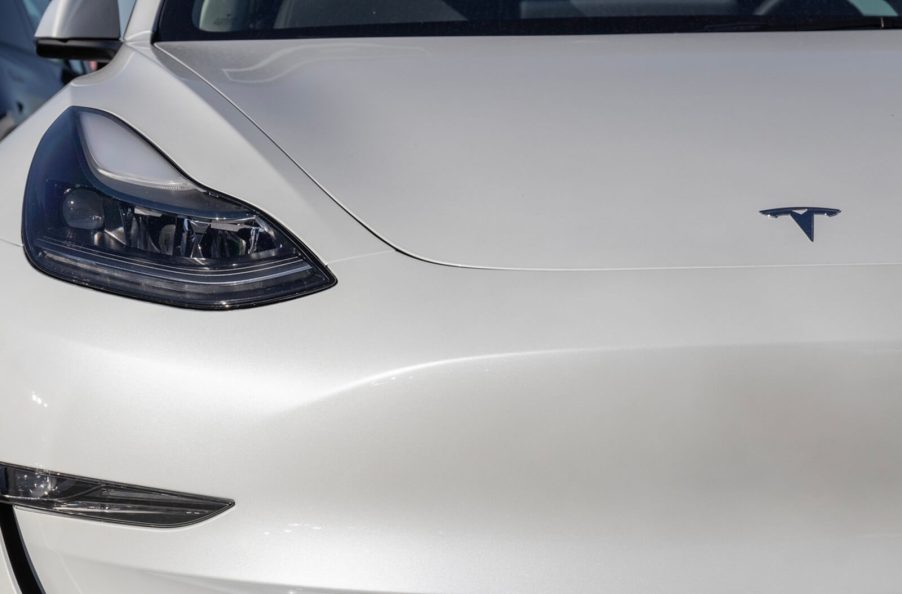 A white Tesla Model 3 in China.