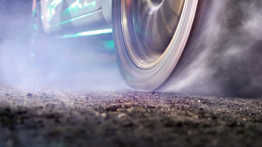 Tire smoke from a high powered supercar requiring a superlicence in the UK