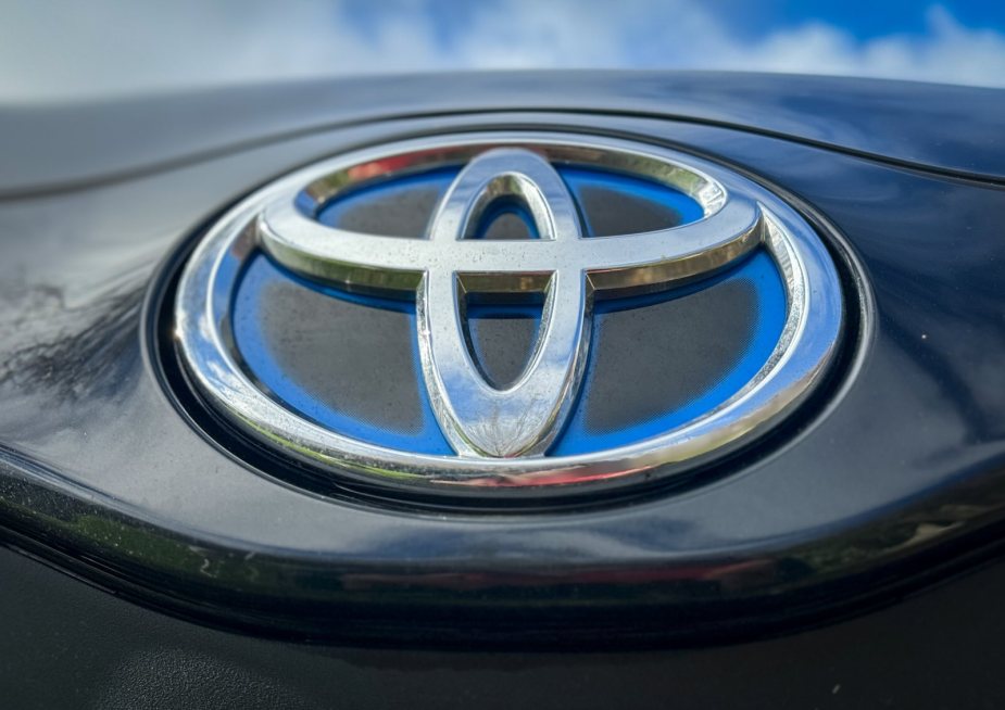 The chrome logo badge on a reliable Toyota car or SUV