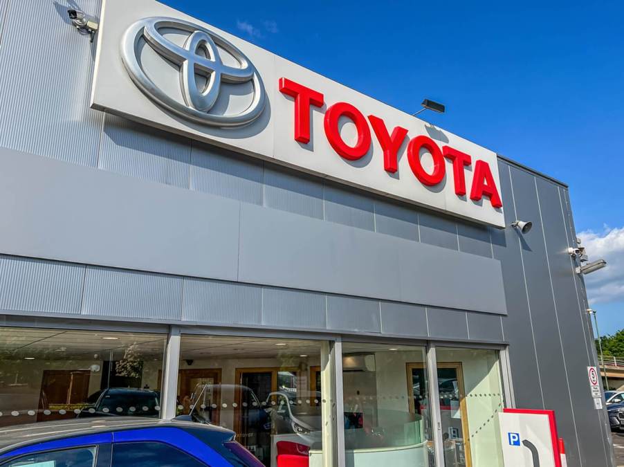 A Toyota location where EVs and gas-powered cars are for sale.