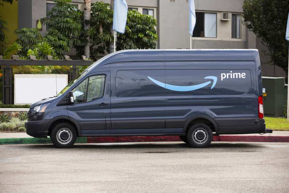 Amazon delivery van parked in full left profile view