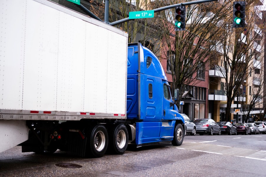 A large semi-truck in the city