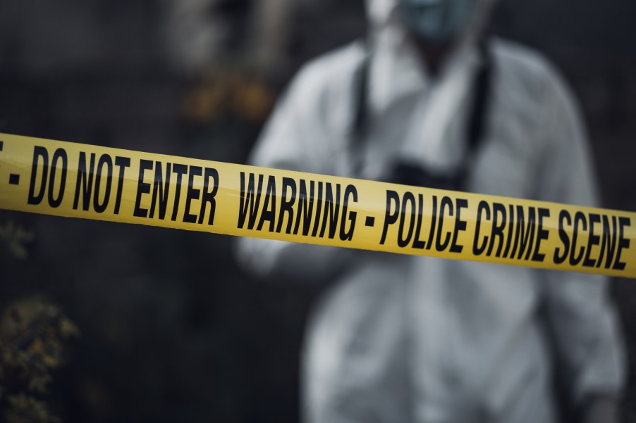 An investigator at a crime scene