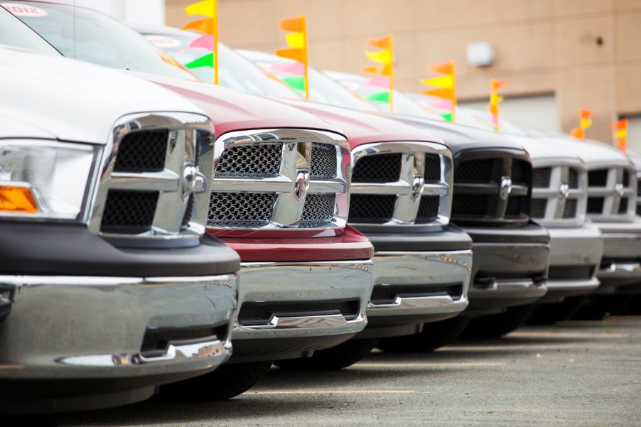 A row of Dodge Ram trucks on a dealership