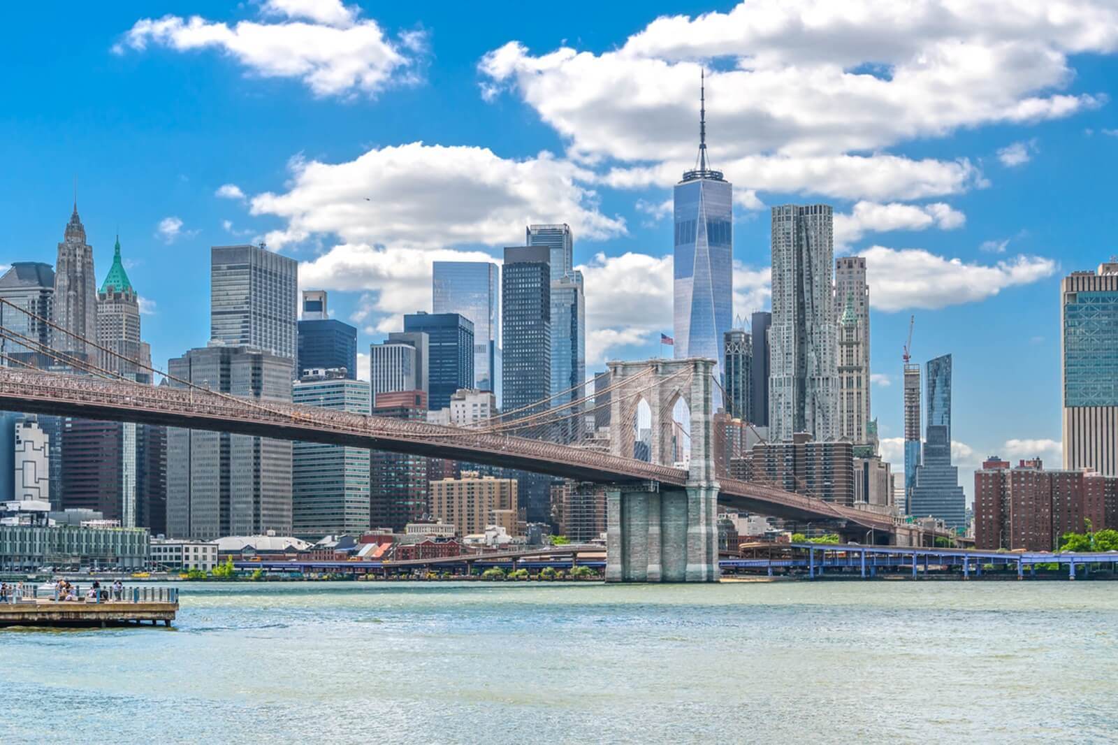 The storied Brooklyn Bridge with the Manhattan skyline in the background.