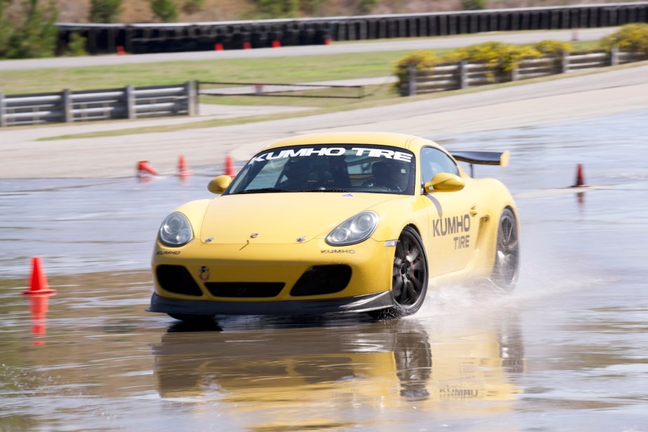 A Porsche doing wet laps with Kumho tires