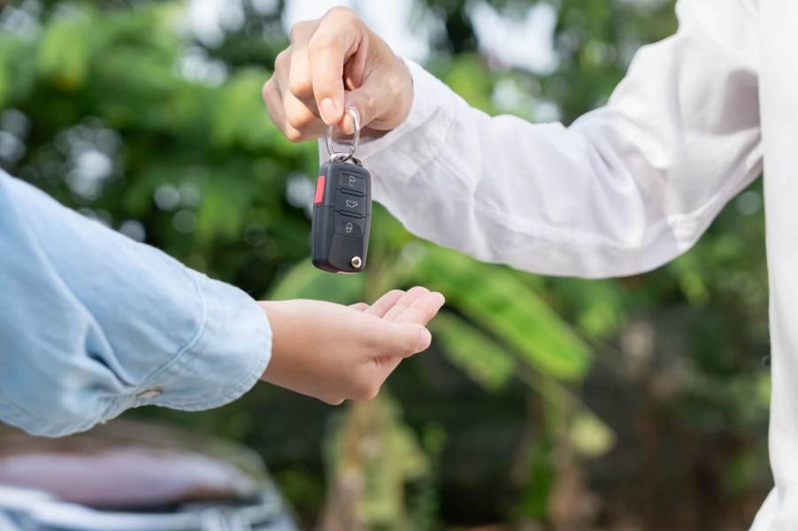 A person goes car shopping for one of the vehicles with the best resale value.