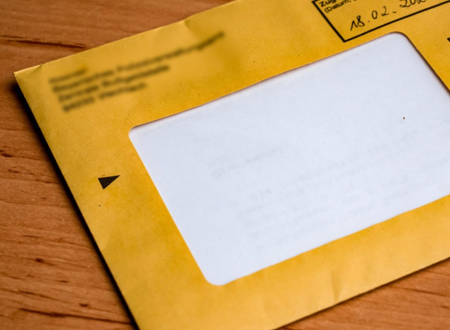 red light fine that city made Ford F-150 owner pay even after truck stolen.