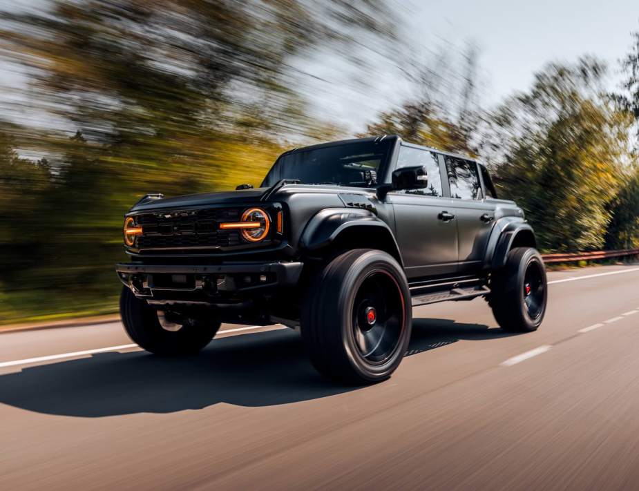 Black Ford Bronco SUV on the highway, with self-driving BlueCruise enabled