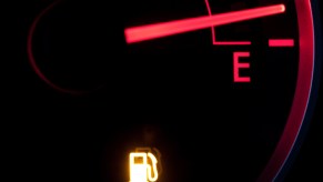 Gas gauge on "E" of stolen car during police chase.
