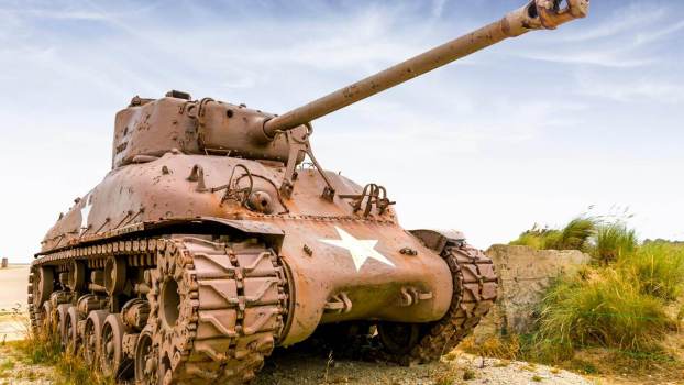 Watch a 98-year-old WWII veteran crush a Tesla Model 3 with a tank