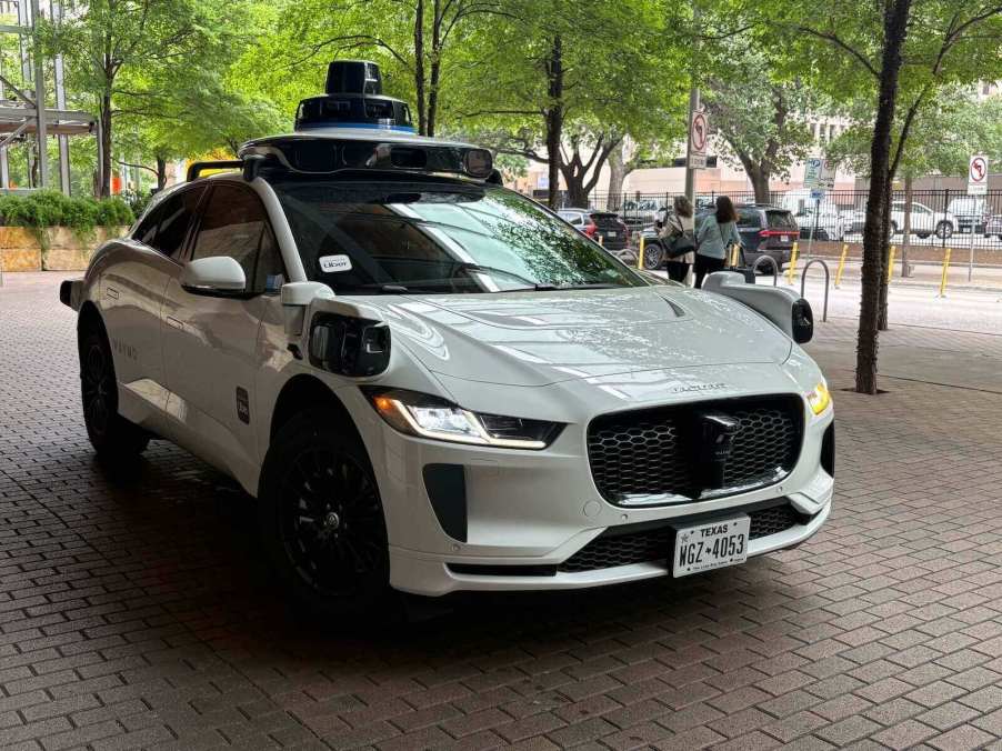 Tesla will partner with Waymo, which produces the AV in this picture, for the self-driving cars.