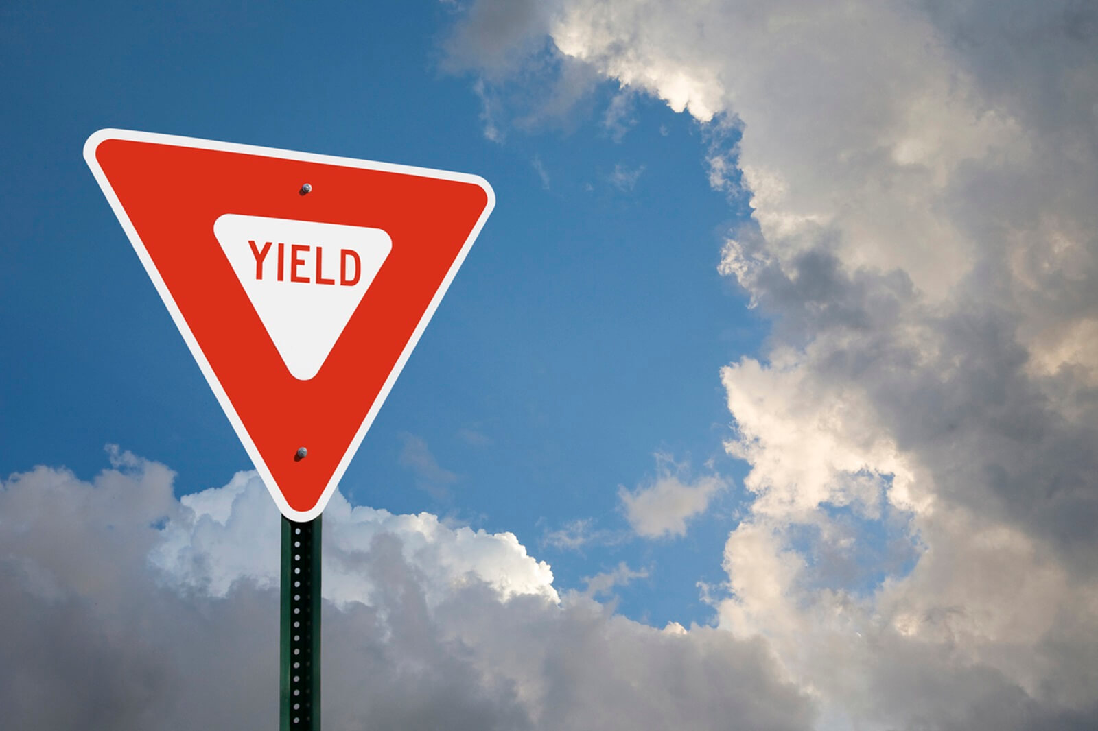 A yield sign like the one a biker ignored when his mom rear-ended him on video.