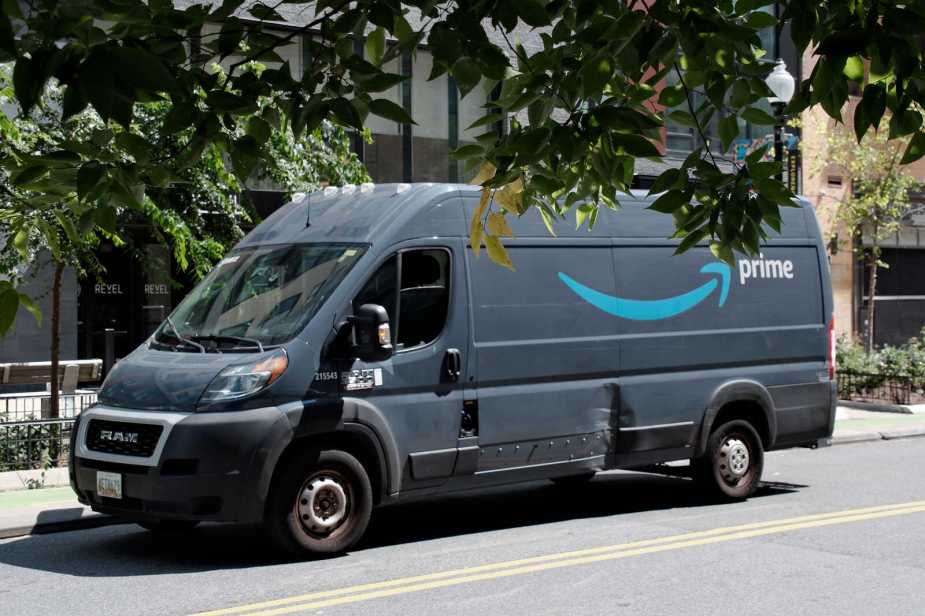 An Amazon delivery van parked in full right front profile view