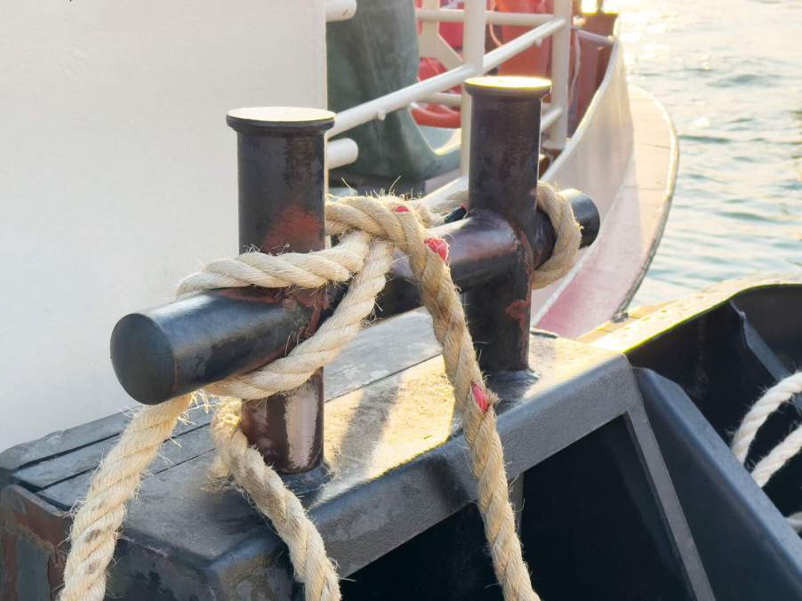 A boat tiedown cleat on a dock