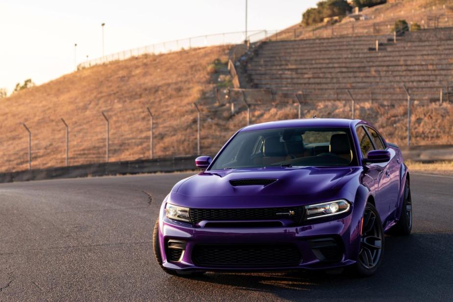 A plum crazy widebody Scat Pack Dodge Charger Hellcat