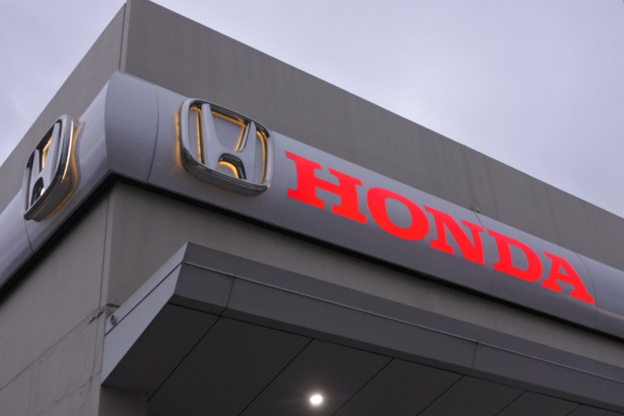 Honda building in close view of lit signage