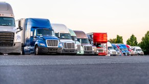 Semi-trucks parked at a truck stop
