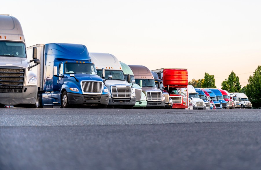 Semi-trucks parked at a truck stop