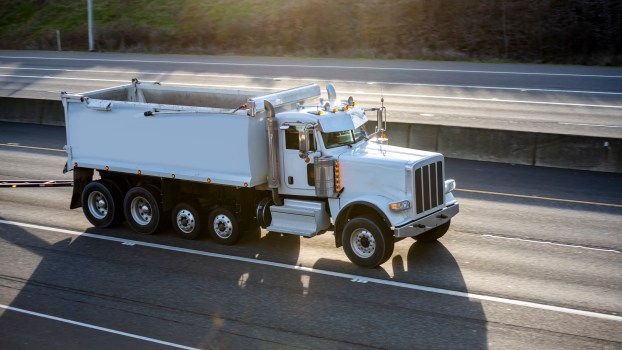 Virginia dump truck tire explodes causing it to fall off overpass and catch on fire