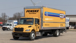 A Penske box truck in a parking lot