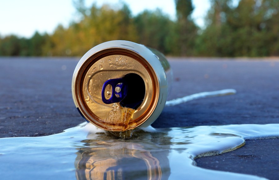 A beer can on the road